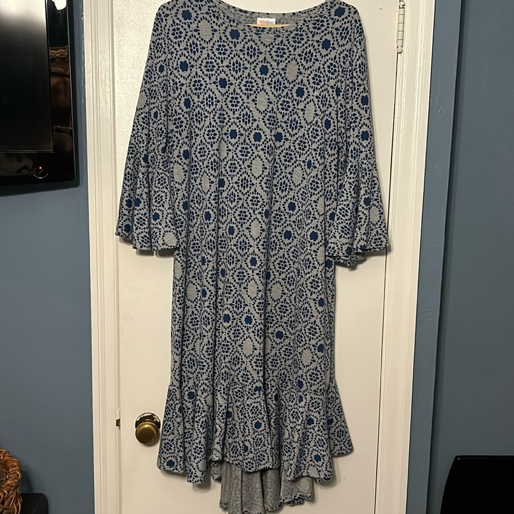 Lularoe poly-spandex dress. Ruffle sleeve and bottom.